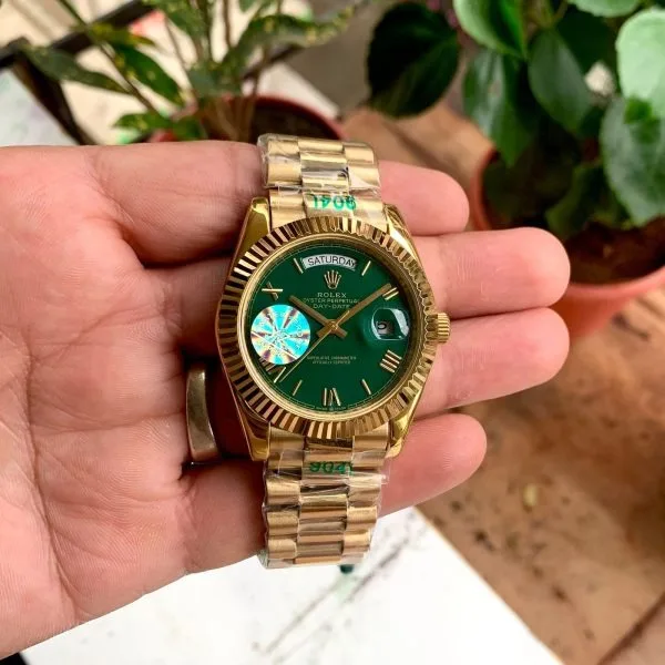 Rolex Day Date Gold Dark Green Roman Dial