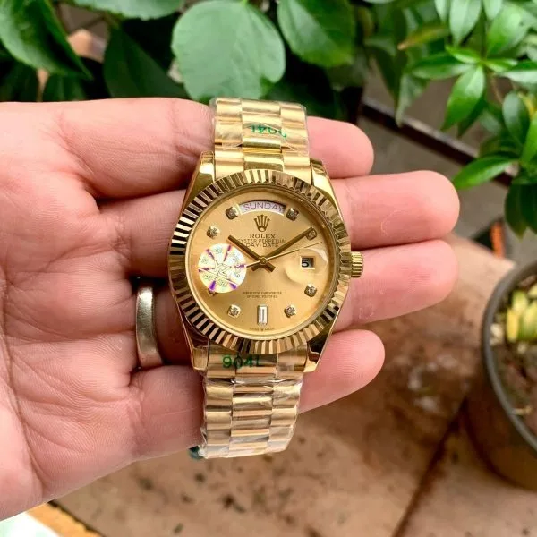 Rolex Day-Date Gold Diamond Fluted Bezel